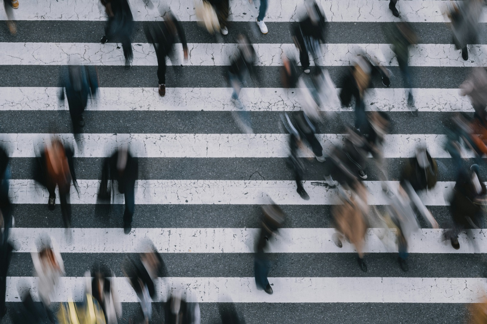 Crowd crossing a city street